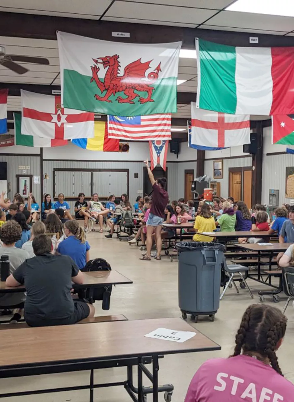 campers gathered at tables in dining hall