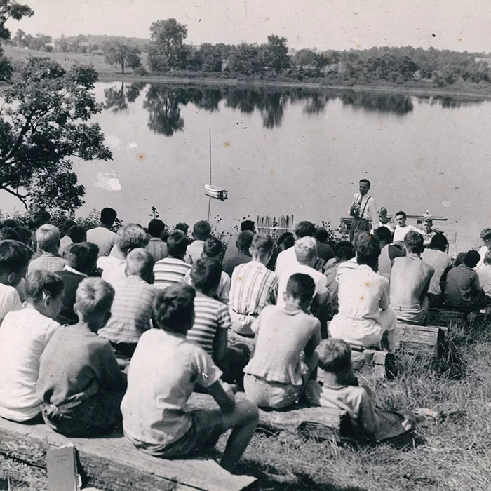 historical view of campers overlooking the lake