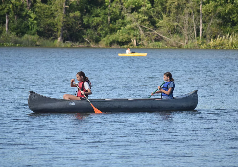 campers canoeing